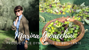 Marina Gioacchini, productrice dans son oliveraie. Olives dans un panier